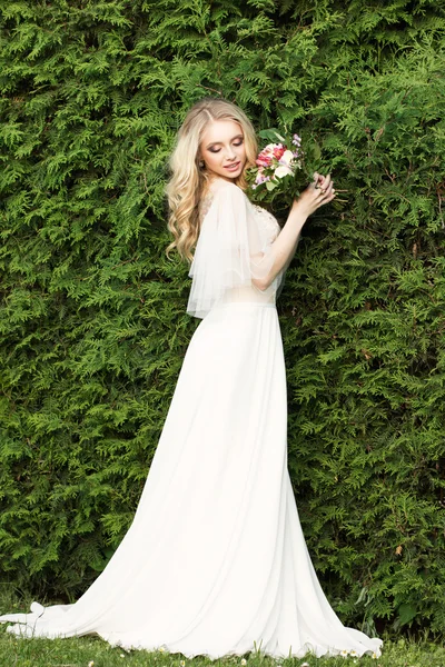 Beautiful bride in park