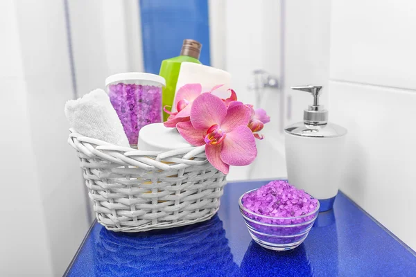 Basket with cosmetics in the bathroom.
