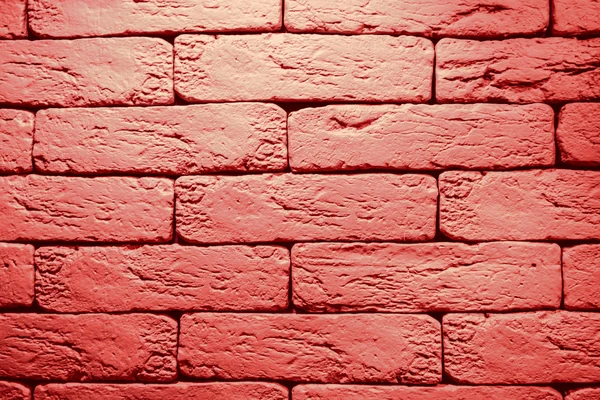 Background of Brick Wall Painted with Red Color closeup