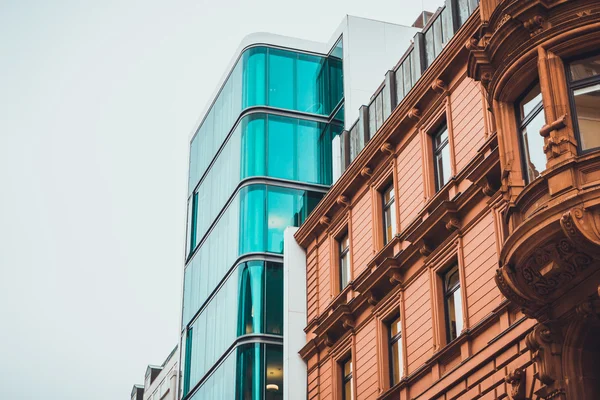 Historic stone building with glass elevator shaft