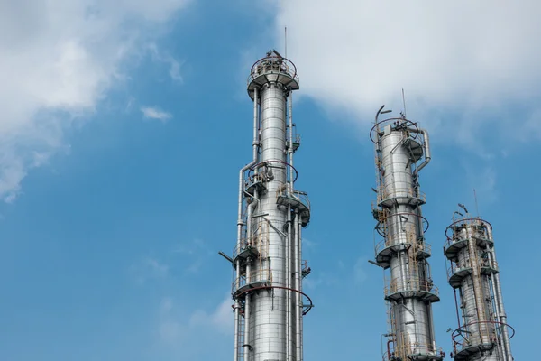 Process Columns of Natural Gas Plant with blue sky background