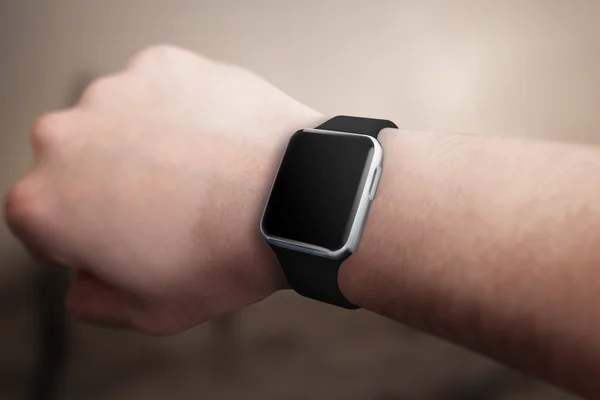 Smart watch on hand with blank screen for mockup.