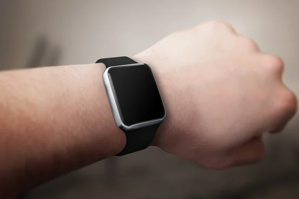 Smart watch on hand with blank screen for mockup.