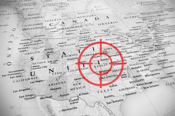 Red aerial target on tilted United States map ( Kansas ), black and white effect