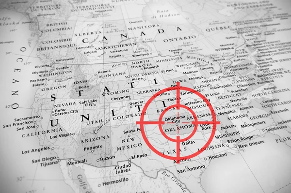 Red aerial target on tilted United States map ( Oklahoma ), black and white effect