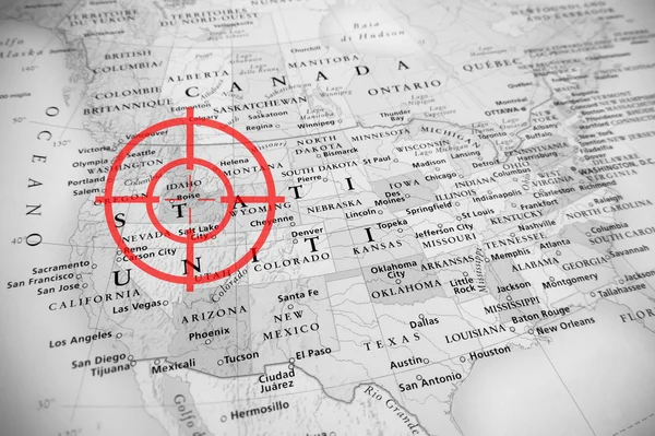 Red aerial target on tilted United States map ( Idaho ), black and white effect