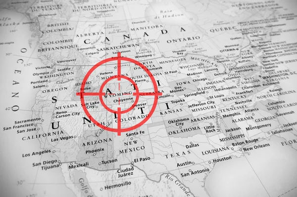 Red aerial target on tilted United States map ( Wyoming ), black and white effect