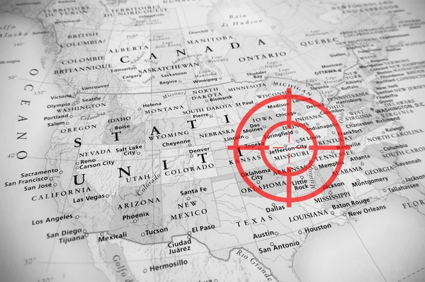 Red aerial target on tilted United States map ( Missouri ), black and white effect