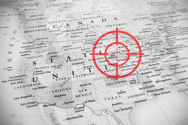 Red aerial target on tilted United States map ( Iowa ), black and white effect