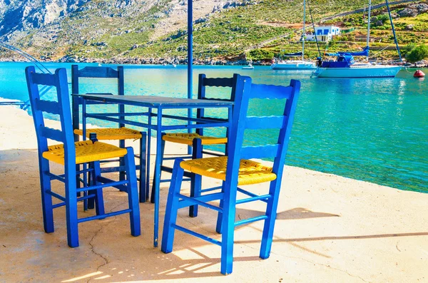 Wooden chairs in classic Greek resturant, Greece