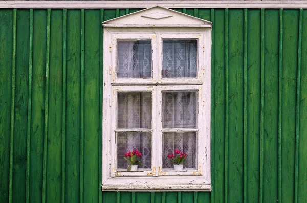 Old blue wooden cottage