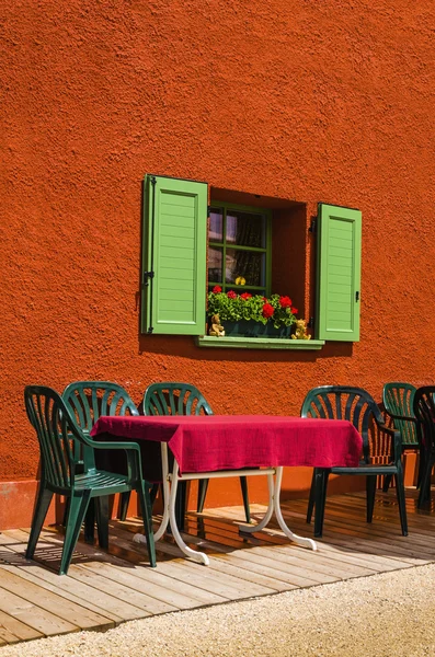 Sunny terrace table chair restaurant