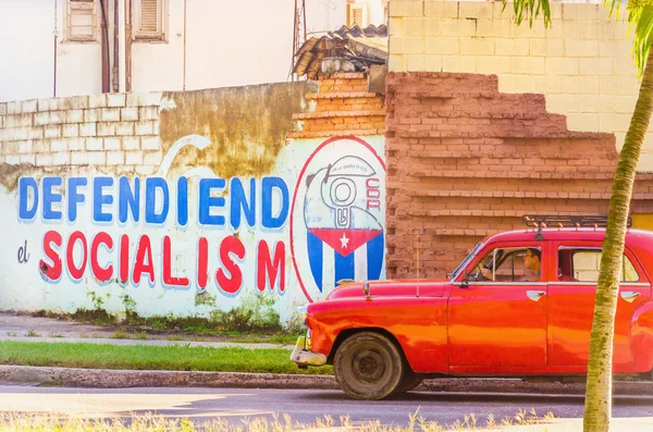 Classic American red car in Havana, Cuba