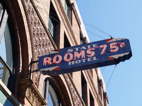 Rooms 75 neon sign