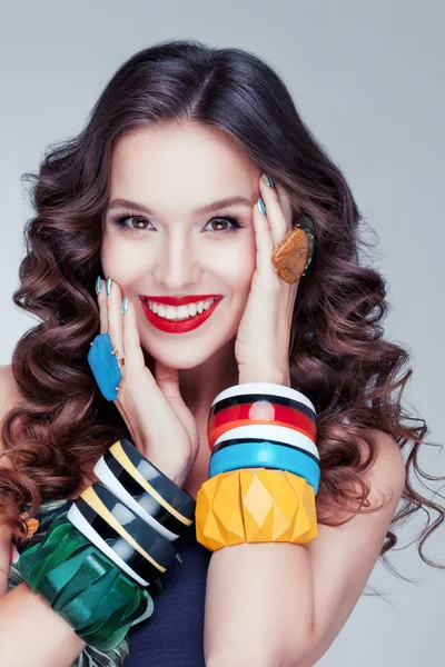 Beautiful attractive caucasian girl with brown chocolate shiny hair and red lips smile.