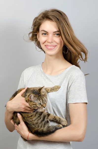 Young beautiful woman with cat