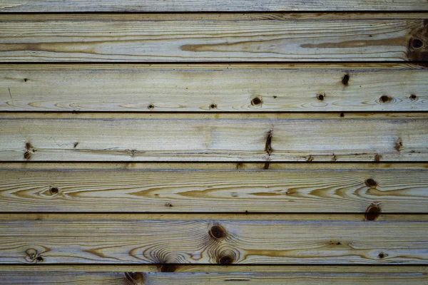 Wall, wooden planks, pine. The texture of the tree. Background