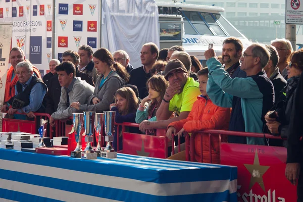 CHRISTMAS DAY HARBOUR SWIM 2015, BARCELONA, Port Vell - 25th December -public watching award ceremony of winners