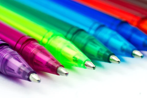 Colorful ballpoint pen on white background