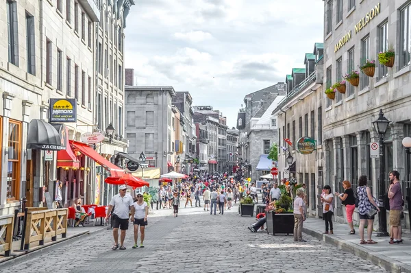 Montreal, Canada - June 6, 2015: Popular St Paul street in the Old Port. People can be seen around.
