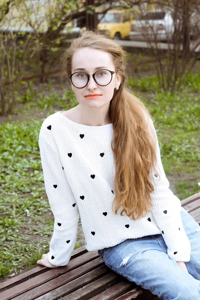 Young beautiful long-haired hipster girl.