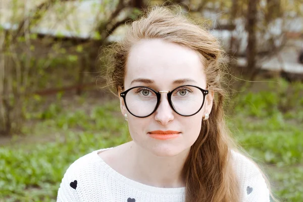 Young beautiful long-haired hipster girl.