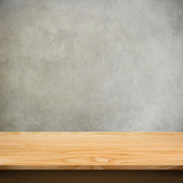 Wood table with concrete texture background