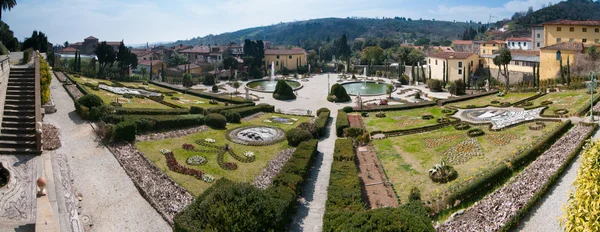 Panorama of Italian garden with flowers and fountains