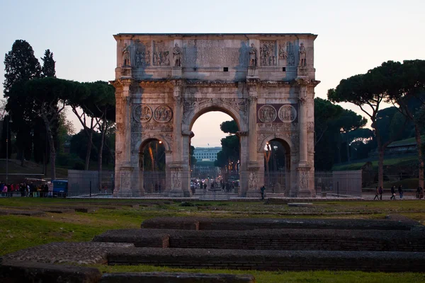 The Arch of Constantine at dusk in Rome, Italy
