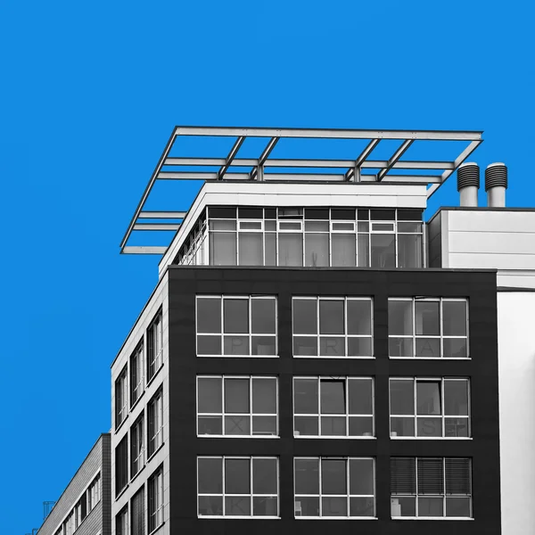 Modern building isolated on blue sky