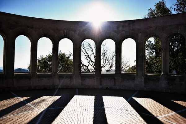 Sun shining over the arcade arch building on Montserrat