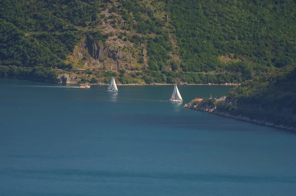 Beautiful landscape with Mediterranean town ,sea and mountains. Montenegro seashore, boats and yachts