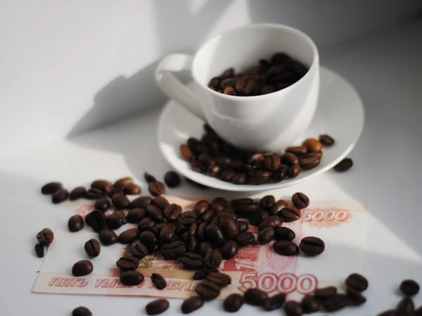 Rubles covered with coffee beans