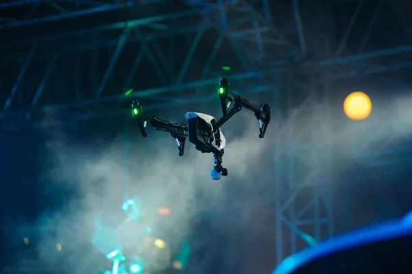 Hovering drone with camera on stage