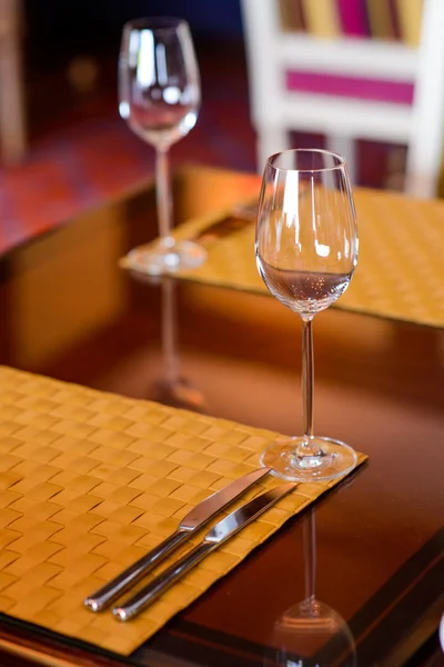 Two empty vine glasses in restaurant