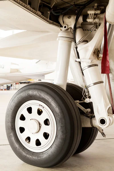 Detail of the wheel and landing gear on a jet