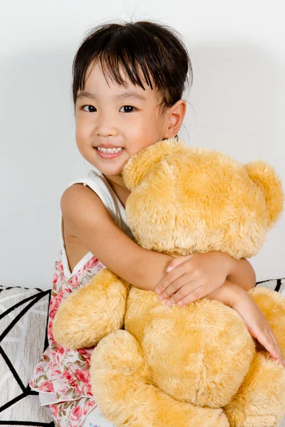 Asian Little Chinese Girl with Teddy Bear