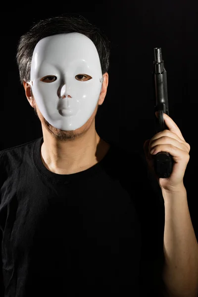 Man in a Mask with a Gun