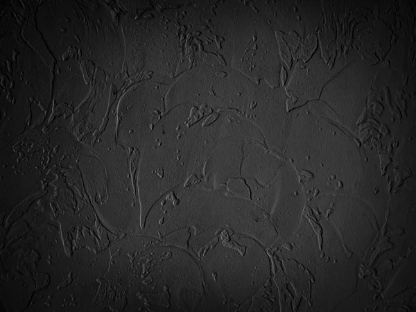 Black background. Grunge wallpaper. Black wall.