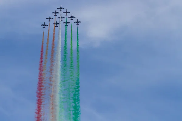 Frecce Tricolori: italian aerobatic Team drawing italian flag with color smoke