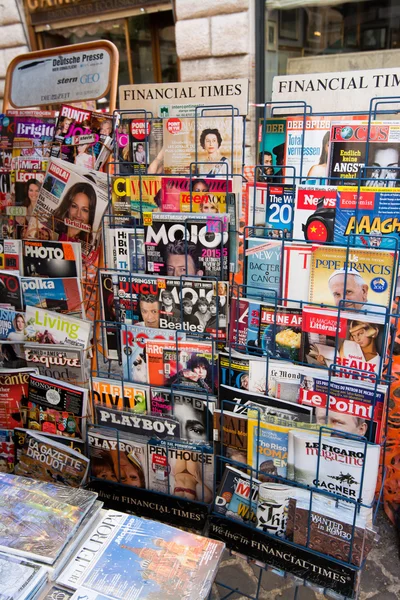 International newspapers and magazines on display in Rome.