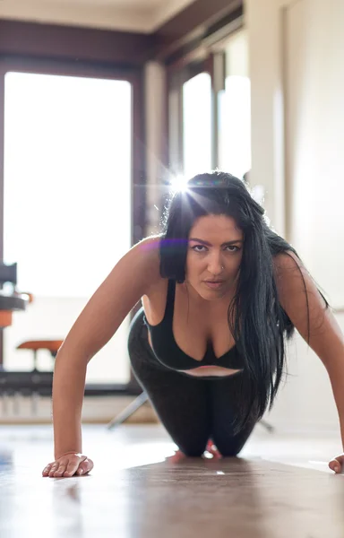 Young Woman Athlete Doing Pushups As Part Of Bodybuilding Traini
