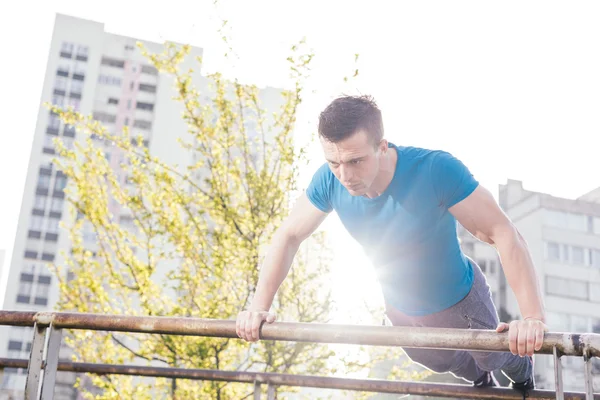 Street workout, confident sportsman