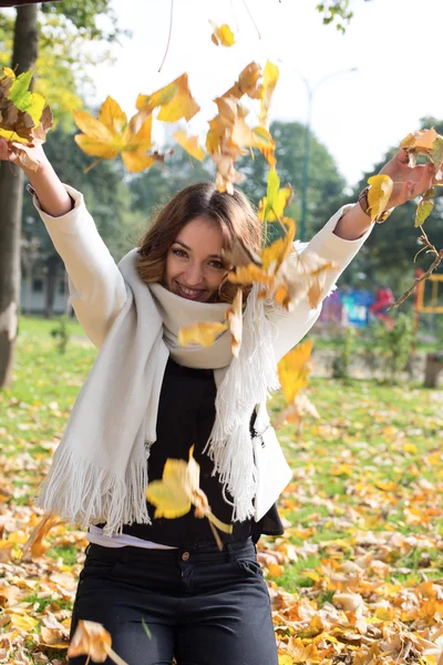 Leaf fall, colorful photo happy positive expression woman having