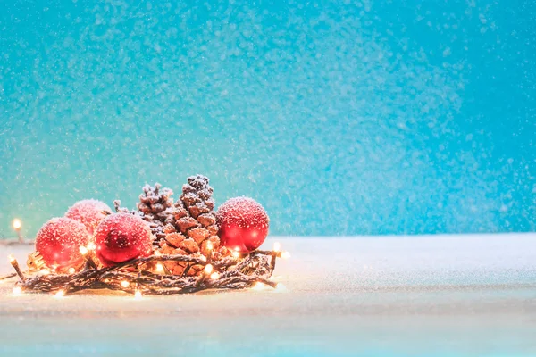 Christmas decorations with candles and pine corn