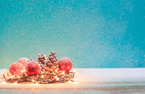 Christmas decorations with candles and pine corn