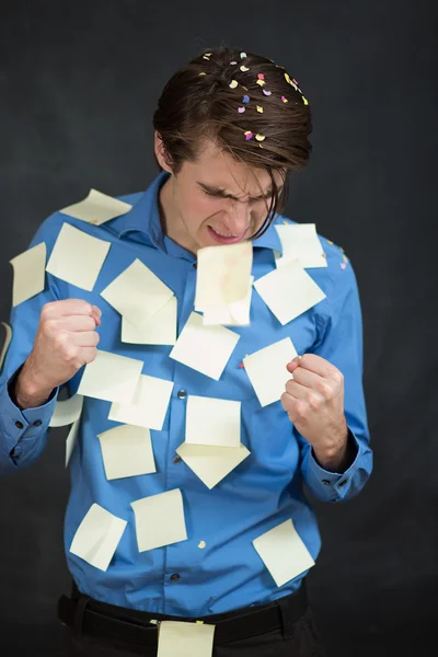 Man covered in yellow notes