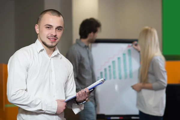 Portrait of young confident men employee dressed in casual cloth