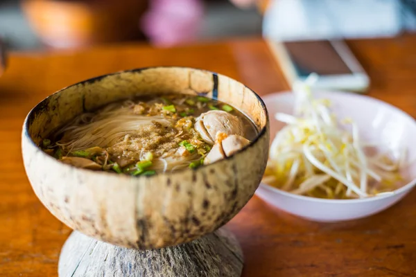 Thai food noodle in coconut shell