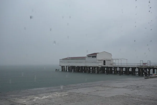 Storm at the pier on the sea, thundercloud